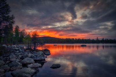 Scenic view of lake against sky during sunset