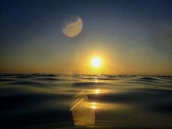 Waves view of sea against sky at sunset on summer in okinawa japan 