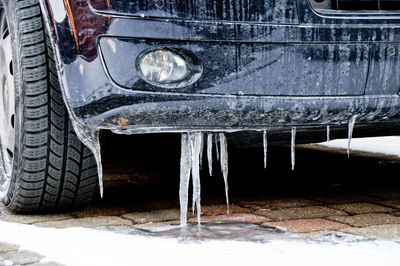 Close-up of rusty car on snow