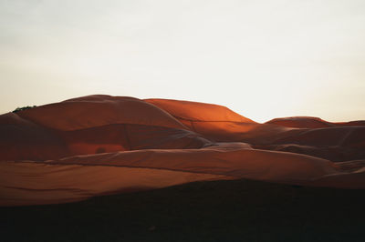 Scenic view of desert against clear sky