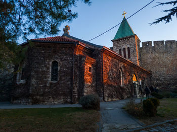 Historic building against sky at dusk