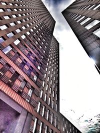 Low angle view of modern buildings against sky