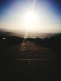 Scenic view of landscape against sky during sunset