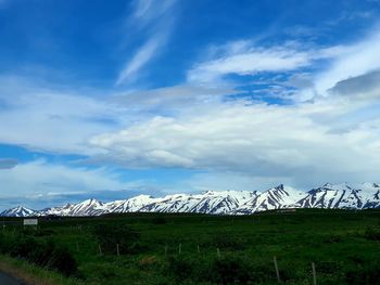 Scenic view of landscape against sky during winter