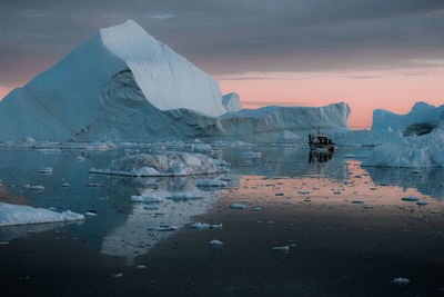 Scenic view of sea against sky during winter