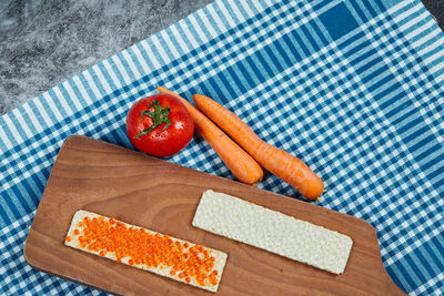 High angle view of sandwich on cutting board