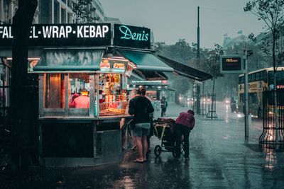 People on street in rain