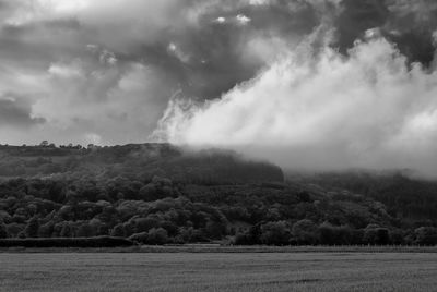 Scenic view of land against sky