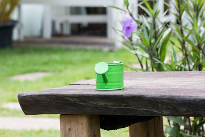 Close-up of toy bottle on table at park