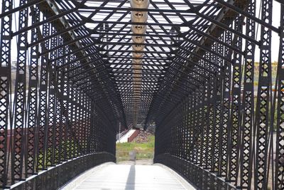 View of bridge through footbridge
