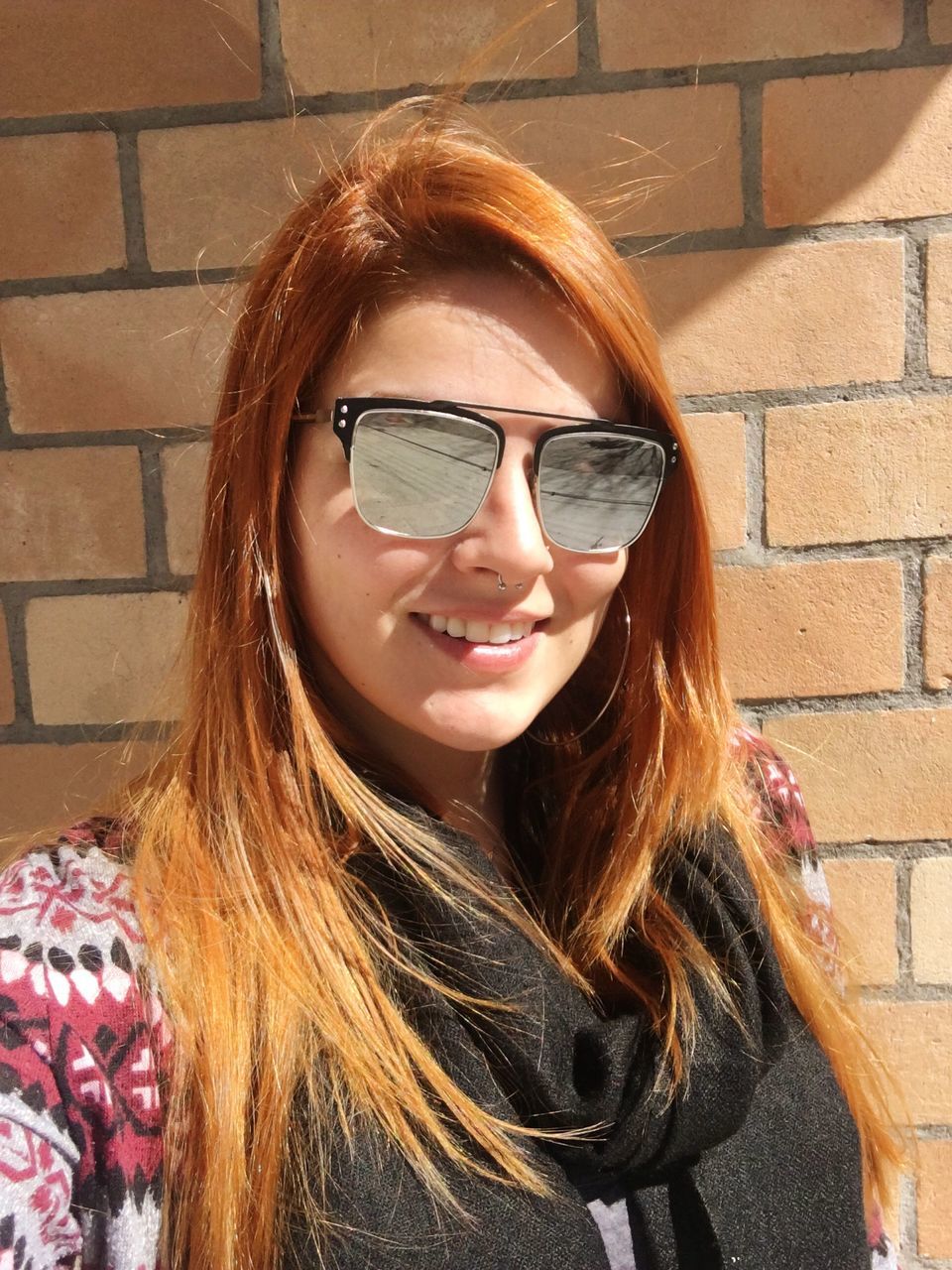 young adult, person, young women, portrait, long hair, front view, lifestyles, sunglasses, smiling, headshot, leisure activity, blond hair, happiness, casual clothing, black hair, toothy smile, close-up, beauty, medium-length hair, day, eyeglasses, focus on foreground, human face, confidence, outdoors, content