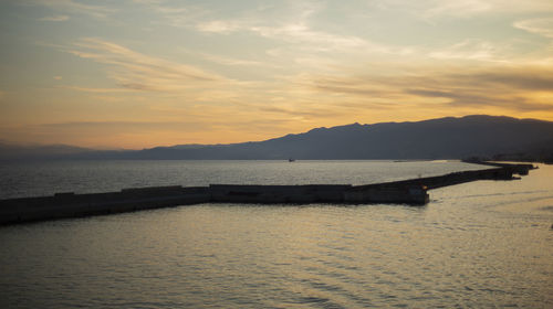 Scenic view of sea against sky during sunset