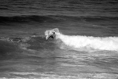 Man surfing in sea
