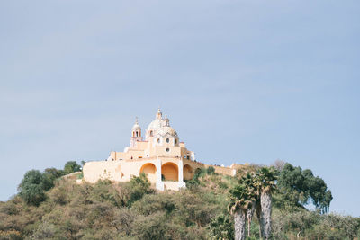 Low angle view of historic building against sky