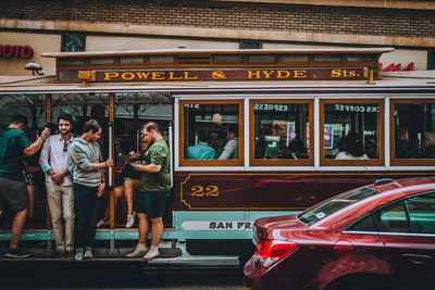 People on road in city
