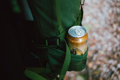 Close-up of hand holding drink