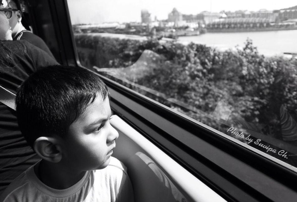 lifestyles, leisure activity, headshot, indoors, transportation, person, focus on foreground, railing, window, rear view, travel, young adult, waist up, glass - material, side view, looking away, transparent, head and shoulders