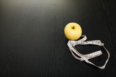 High angle view of apple on table
