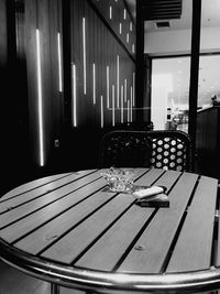 Empty chairs and tables in restaurant