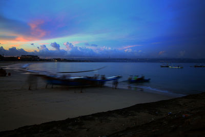 Scenic view of sea against sky at sunset