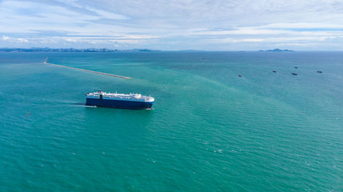 Boat in sea against sky