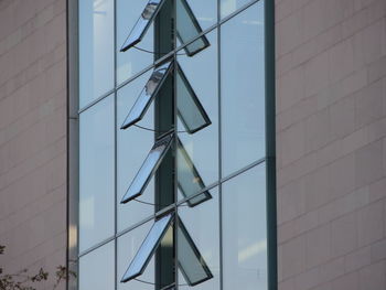 Low angle view of wind turbine against sky