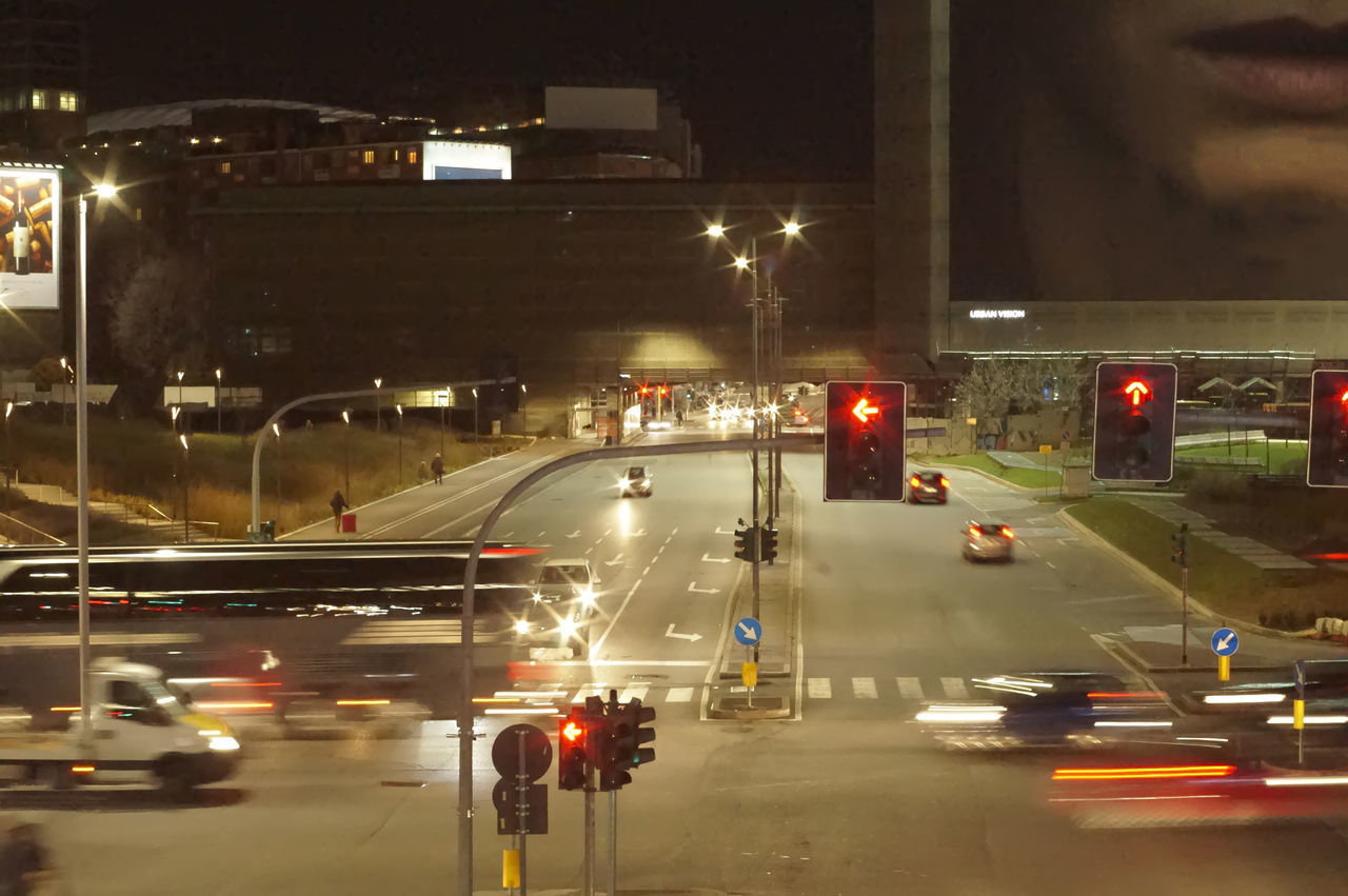 CARS ON ROAD AT NIGHT