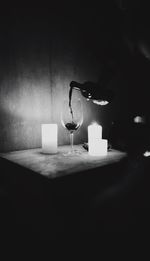 Close-up of tea light candles on table