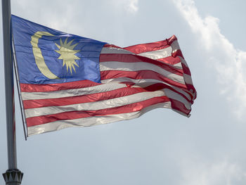 Low angle view of malaysia flag against sky