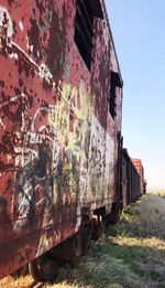 Abandoned boat against clear sky