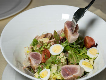 Close-up of salad in bowl on table