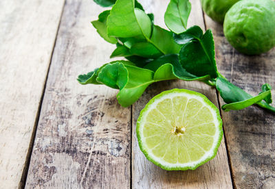 High angle view of green fruits on table