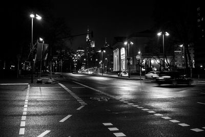 Illuminated street at night