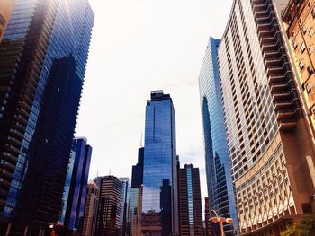 Low angle view of office building against sky