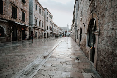 Narrow alley along buildings