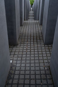 High angle view of cobblestone street at cemetery