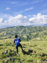 A man hiking in the mountains of  oslob, cebu. 