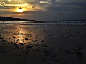 Scenic view of sea at sunset