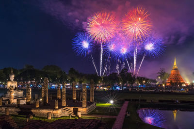 Fire works at sukhothai historical park during loy krathong light and candle festival, 