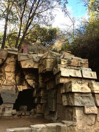 Low angle view of stone wall