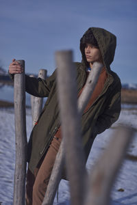 Man standing outdoors during winter