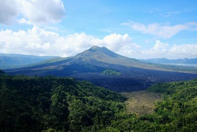 Landscape with mountain range in background