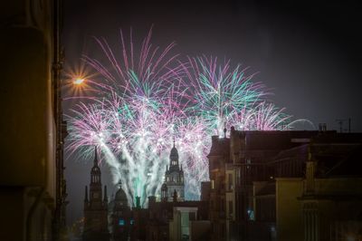 Firework display at night