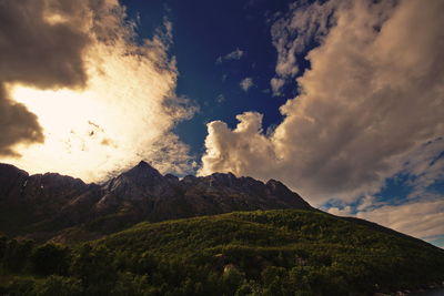 Low angle view of mountain against sky during sunset