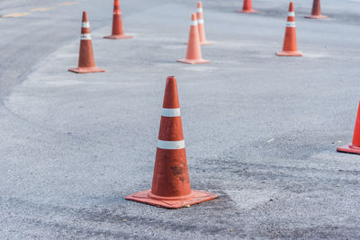 Traffic cones on road in city