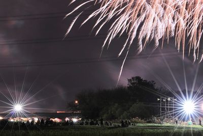 Firework display at night