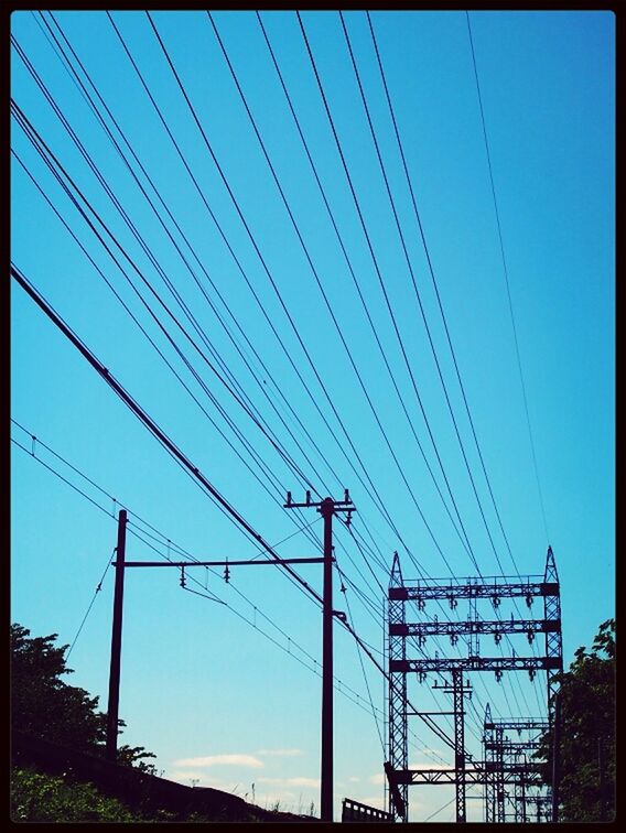power line, electricity pylon, power supply, electricity, connection, fuel and power generation, low angle view, cable, technology, power cable, transfer print, clear sky, sky, blue, auto post production filter, electricity tower, outdoors, day, silhouette, no people