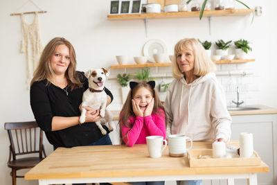 Portrait of smiling family at home