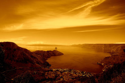 Scenic view of mountain against sky during sunset