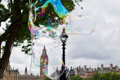 View of bubbles with rainbow in background